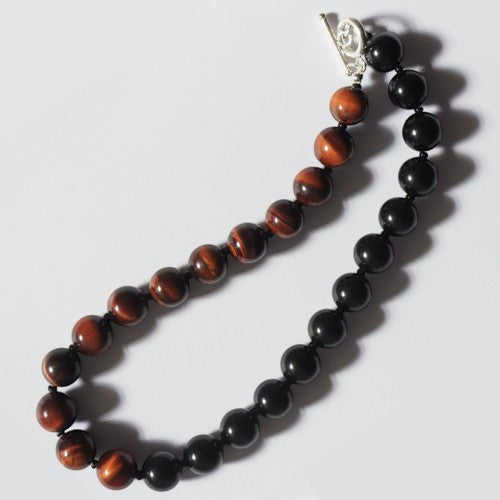 Each One Clara Necklace with red tiger eye and black obsidian beads and sterling silver clasp.