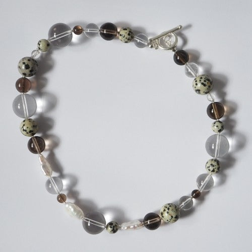 Each One Courtney Necklace with Smoky Quartz, Clear Quartz, Dalmatian Jasper, and Freshwater Pearls on sterling silver clasp.