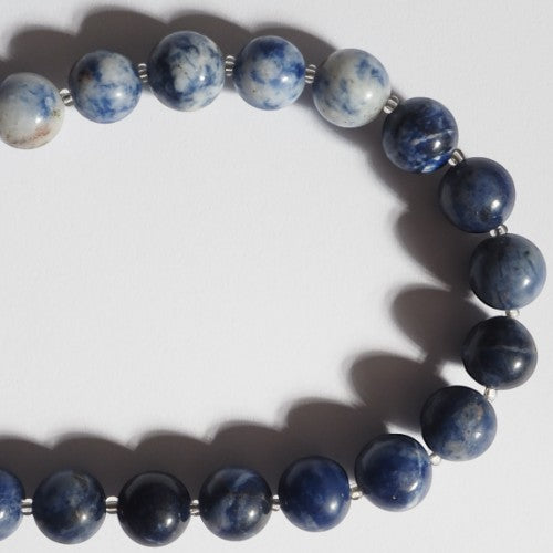 Each One Elara Necklace with deep blue marbled sodalite beads and silver spacers, approx. 42cm length.