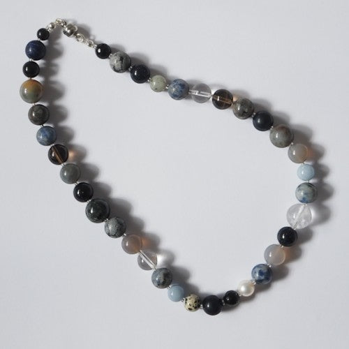 Each One Margot Necklace with agate, sodalite, obsidian, quartz, lepidolite, sandstone, hawk's eye, jasper, and pearl beads. Magnetic clasp.