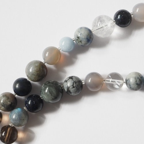 Each One Margot Necklace with agate, sodalite, obsidian, quartz, lepidolite, sandstone, hawk's eye, jasper, and pearl beads. Magnetic clasp.