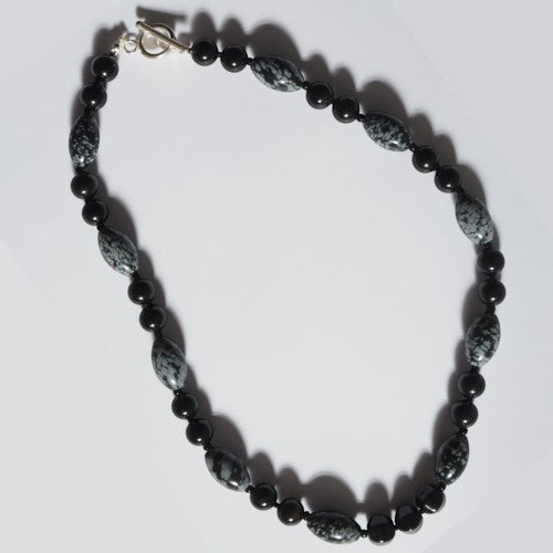Each One The Rachel Necklace with black obsidian, snowflake obsidian, and black agate beads and sterling silver toggle clasp.